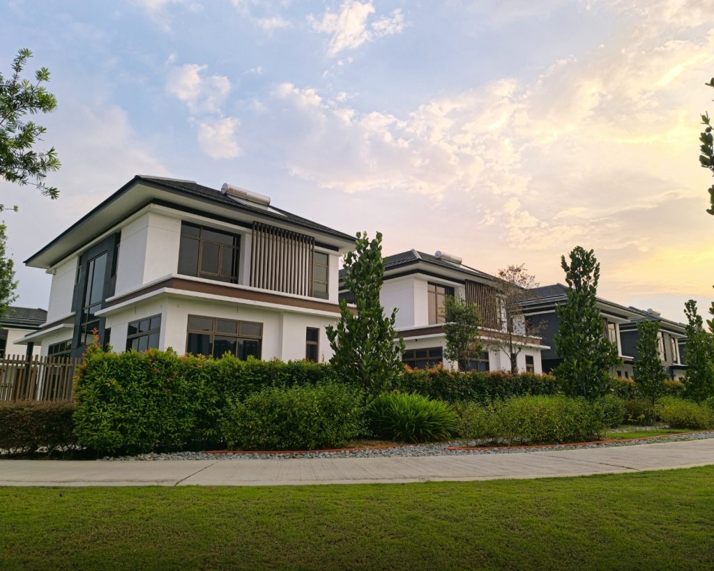 Sunlight hitting the exterior of a beautiful, modern two-story home in a quiet San Francisco Bay Area neighborhood.